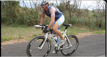 Man Biking During Triathlon Athletic Training